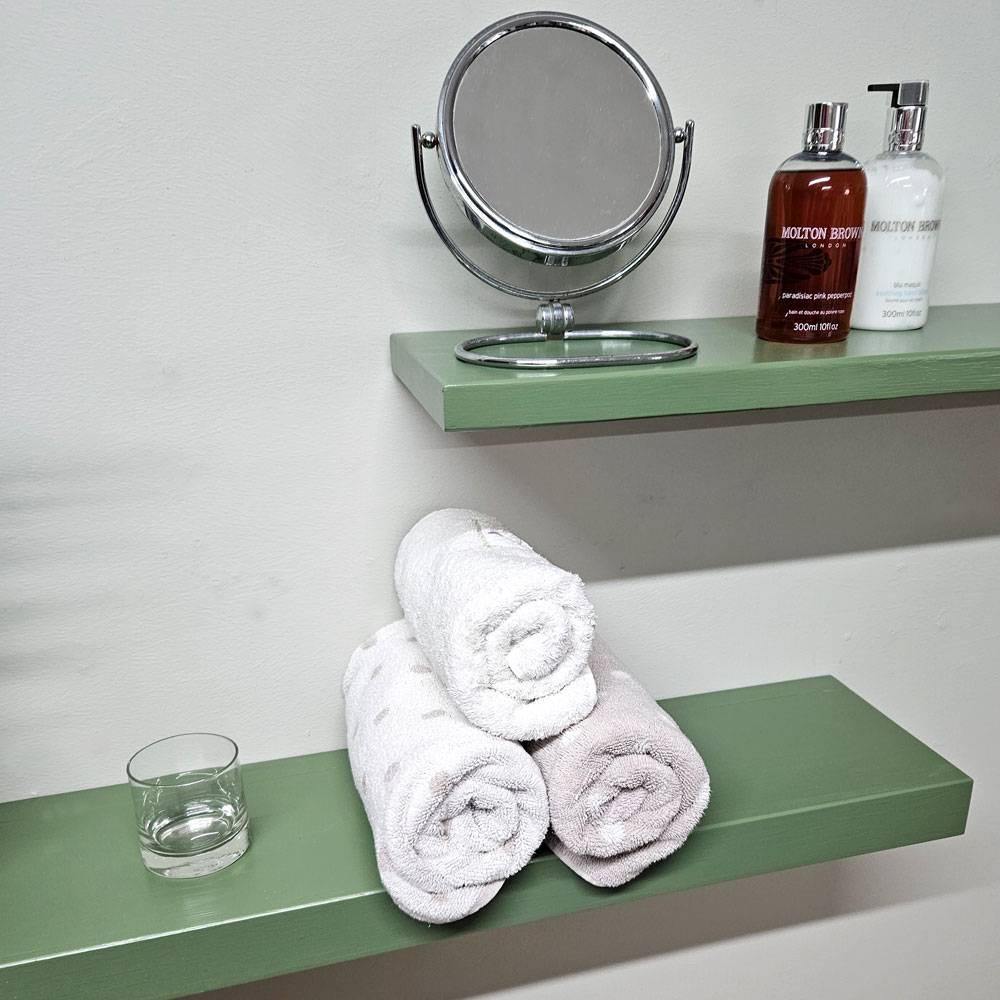 Bathroom Storage Shelving being shown in green