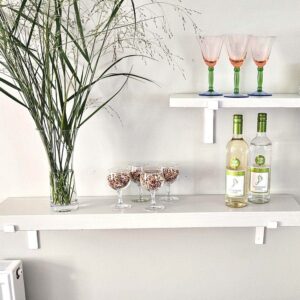 White Shelves with white down brackets.